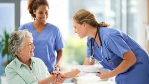 Nurse excited that her patient practices good medical record managment