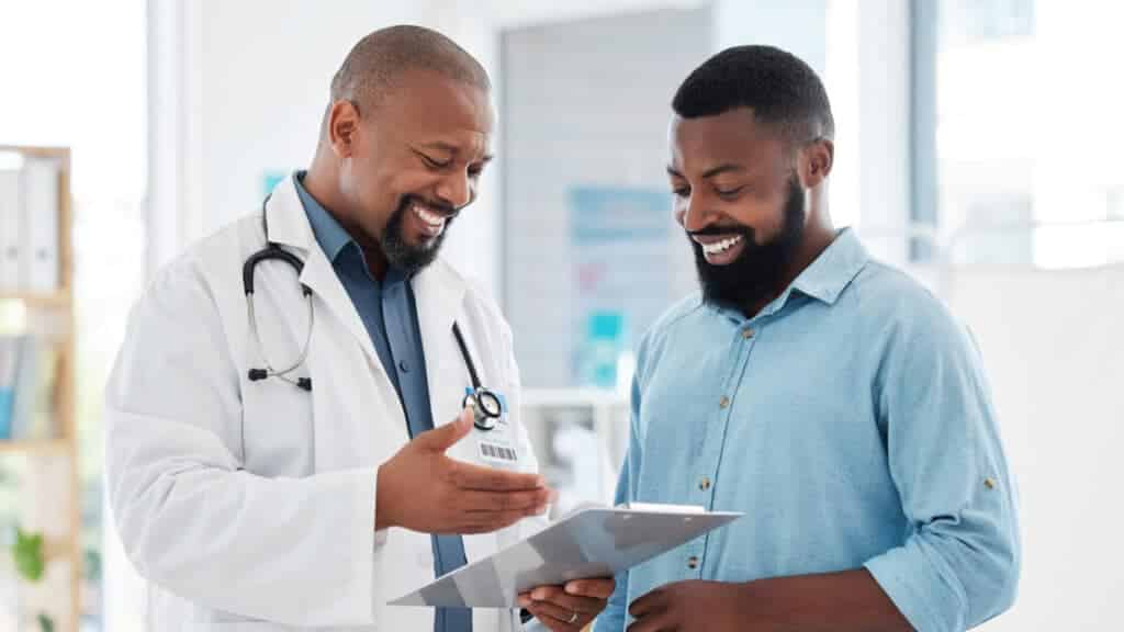 A healthcare professional attentively listening to a patient, exemplifying 'Empathetic Listening' in a clinical conversation.