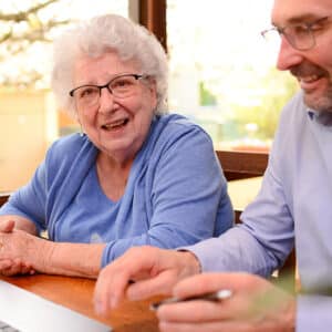 Son preparing for his elderly mother's medical appointment with a SOAP Note