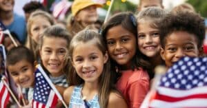 Group of smiling children holding American flags at an outdoor patriotic event, symbolizing unity and hope for a healthier future, aligned with the Make America Healthy Again Movement and Patient Better health navigation education.