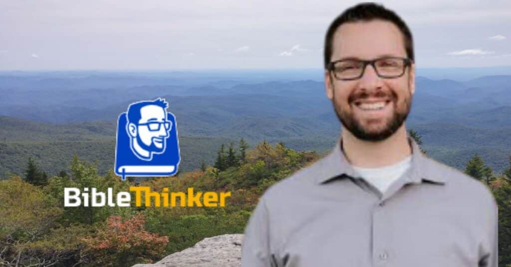 Pastor Mike Winger, founder of 'Bible Thinker,' smiling in front of a scenic mountain landscape. The Bible Thinker logo, featuring a stylized illustration of a man with glasses and a book, is displayed alongside the tagline 'Helping You Learn to Think Biblically About Everything.' Website link: https://biblethinker.org/.