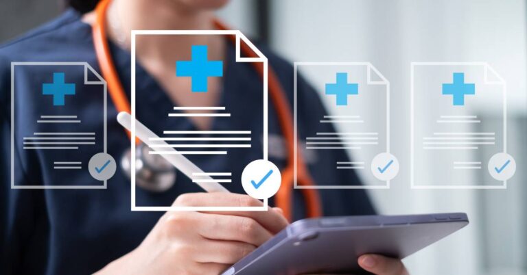 Healthcare professional using a digital tablet to update patient records, symbolizing longitudinal care and continuous tracking of health over time.