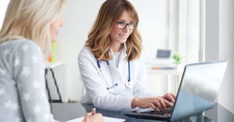 A doctor discussing immune health with a patient, illustrating how immunology connects scientific knowledge with personalized patient care.